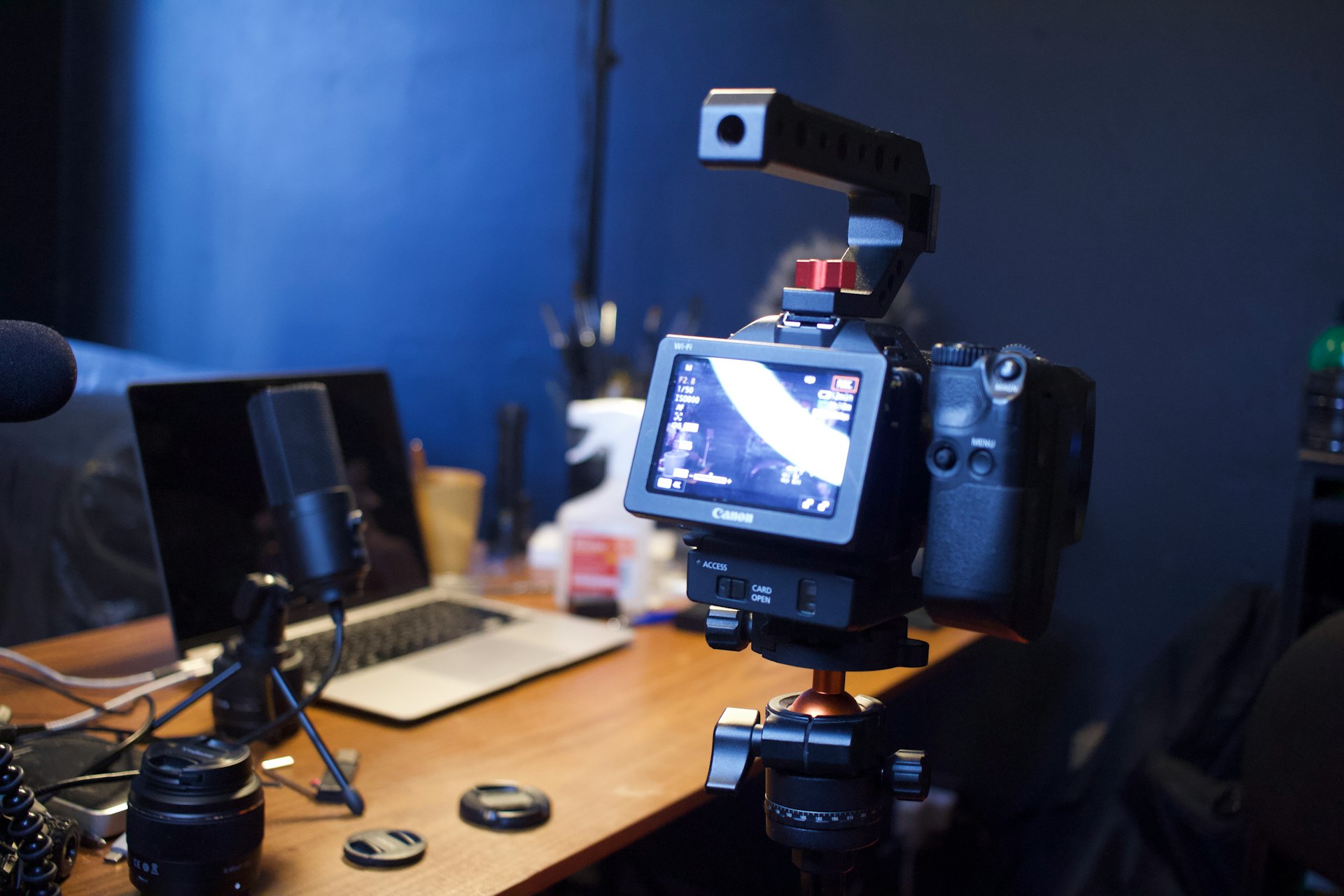 a video camera sitting on top of a wooden table